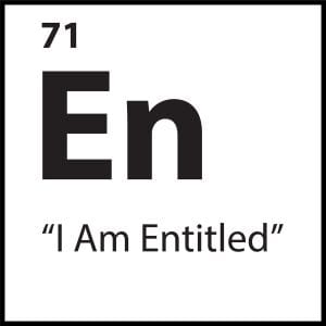 Black and white tile with the elemental symbol “En” and the belief label “I Am Entitled” — part of ShiftGrit’s 77 core belief system.