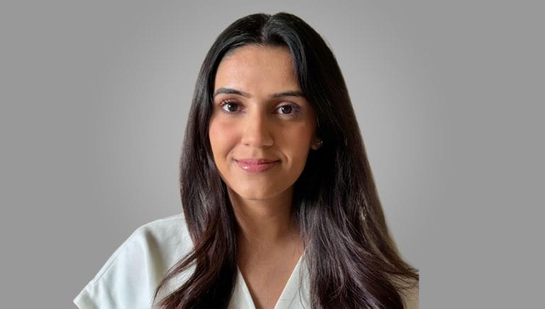 Portrait of Ashima Saini, Registered Provisional Psychologist with ShiftGrit Therapy in Edmonton, specializing in trauma, anxiety, identity, and relationship work.