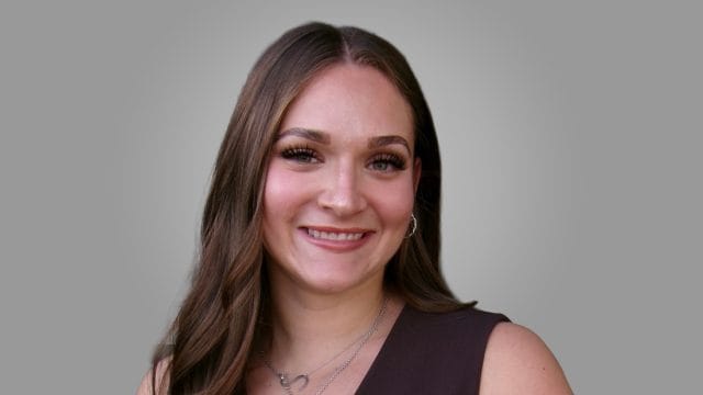 Professional portrait of Alexandra Brad, Registered Provisional Psychologist in Calgary at ShiftGrit Psychology.