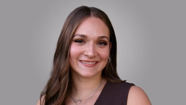 Professional portrait of Alexandra Brad, Registered Provisional Psychologist in Calgary at ShiftGrit Psychology.